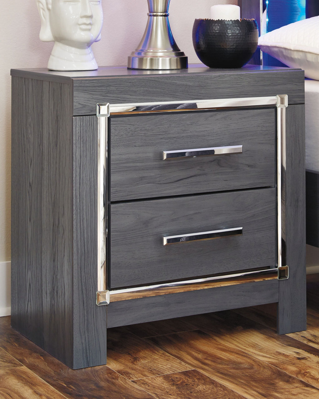 Gray two-drawer night stand with chrome bar handles and metal drawer frame