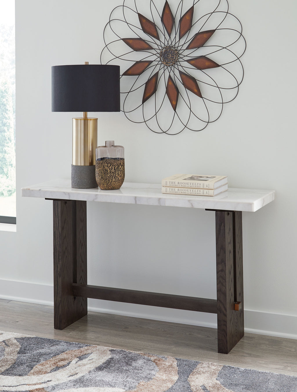 White marble sofa table with dark brown wood legs and open center apron