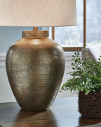Antique gold metal table lamp base with beige drum fabric shade