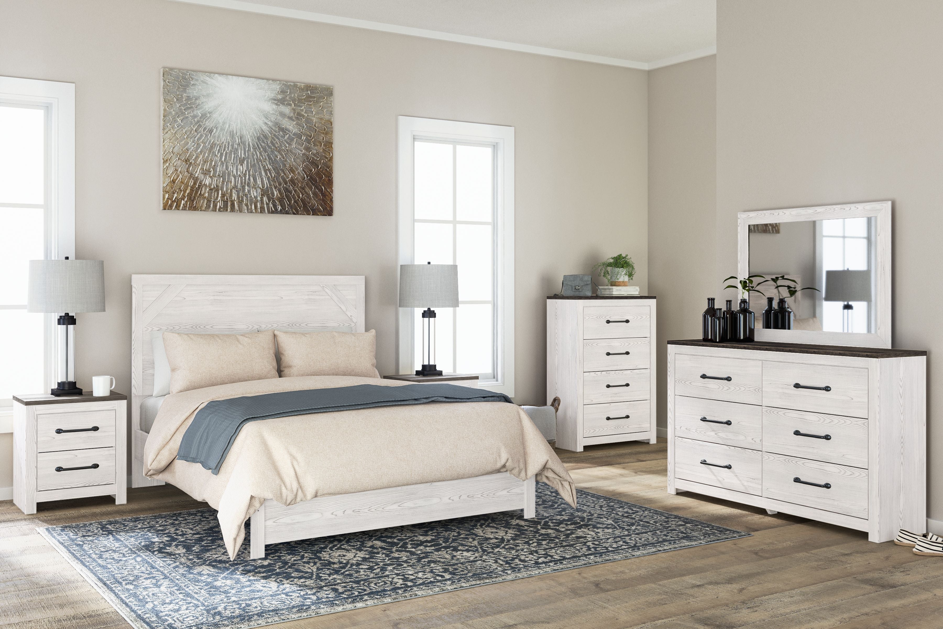 White dresser with mirror above drawers, dark wood top and black bar pulls