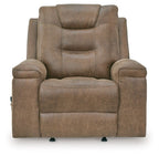 Earth-toned rocker recliner chair with tall back, cushioned armrests, and visible feet