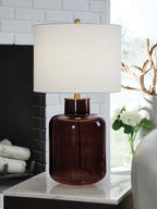 Brown glass table lamp with drum white shade and gold-topped neck
