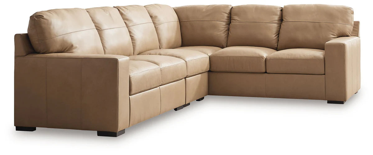 Two-tone sectional sofa with square arms, plush cushions, and tan and cream upholstery