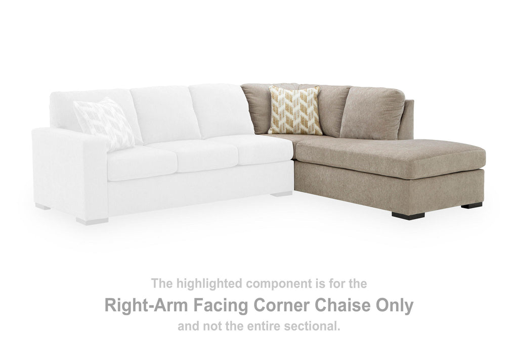 Right-arm facing corner chaise: stone upholstered chaise with back cushions and black legs