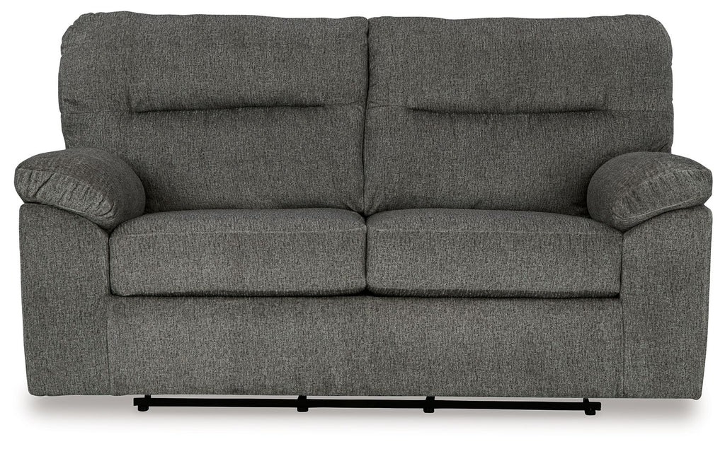 Glider loveseat front view, dark gray upholstery with padded arms and two back cushions