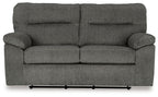 Glider loveseat front view, dark gray upholstery with padded arms and two back cushions