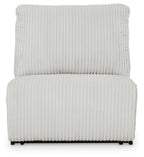 Light gray armless recliner chair with ribbed backrest and cushioned seat