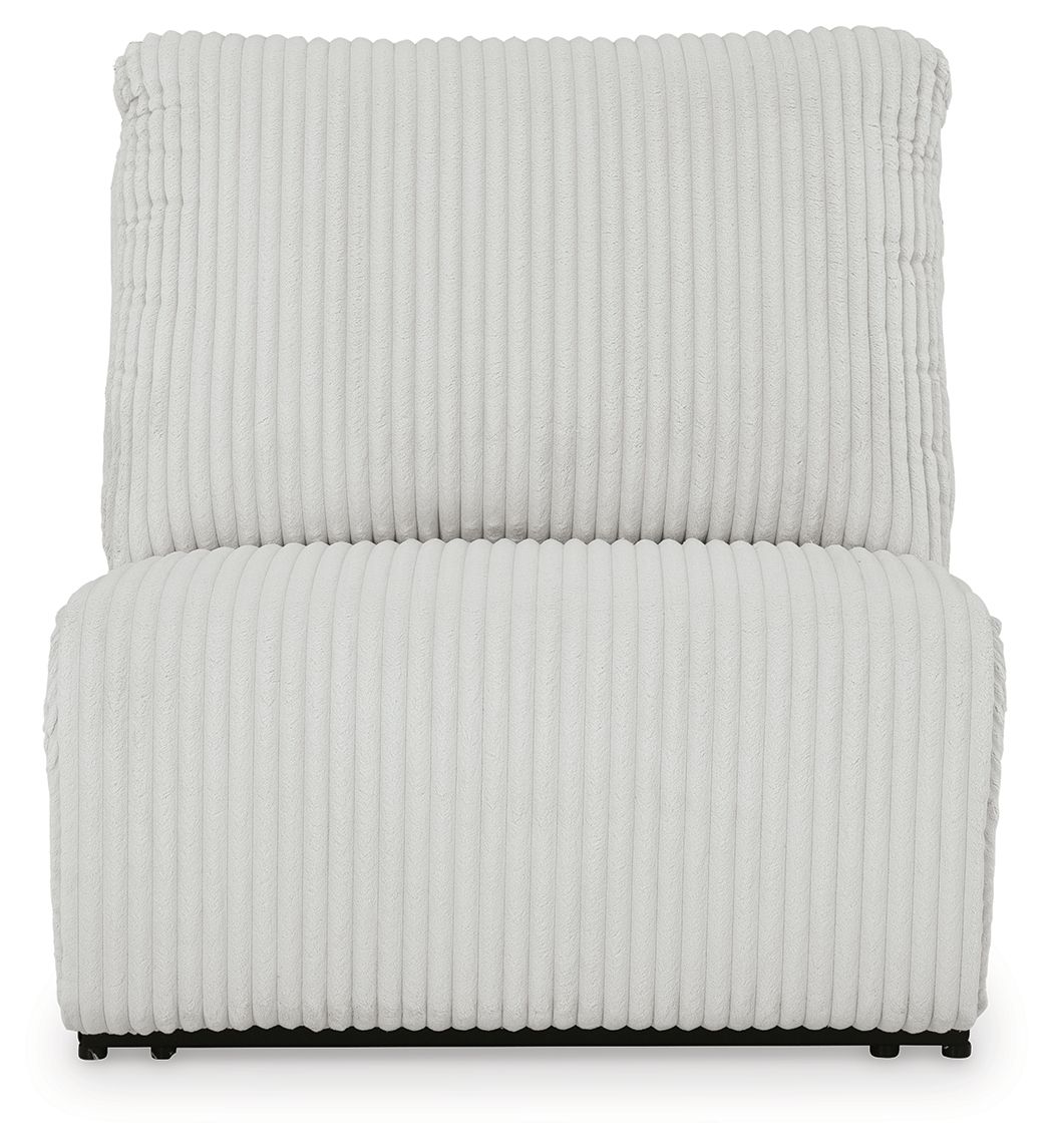 Light gray armless recliner chair with ribbed backrest and cushioned seat