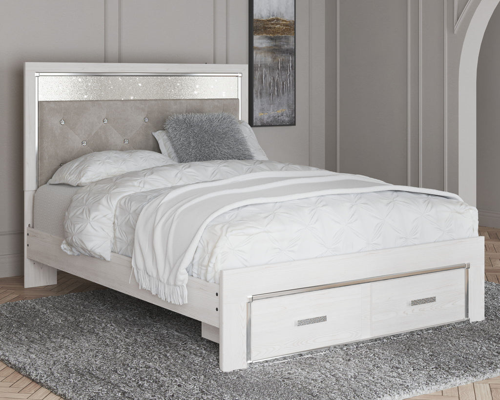 White panel bed with light gray upholstered headboard and footboard drawers on carpeted floor.