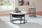 Black metal nesting table set with round white marble-look tops and dark curved base
