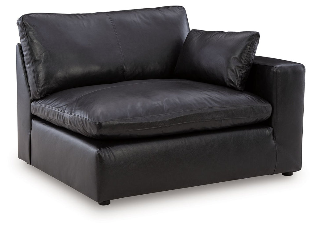 Black RAF corner chair, single seat with backrest and matching throw pillow, vinyl
