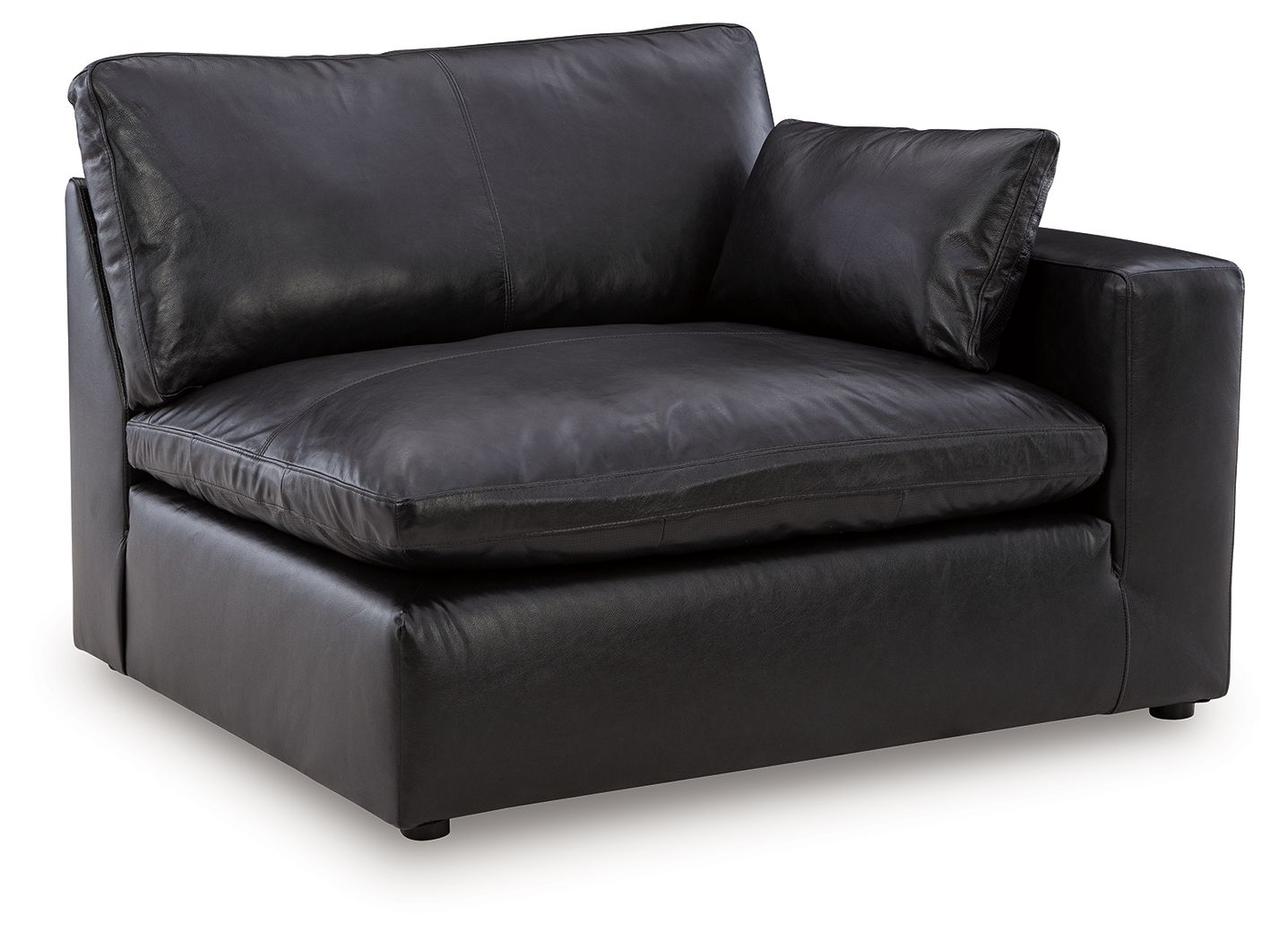 Black RAF corner chair, single seat with backrest and matching throw pillow, vinyl