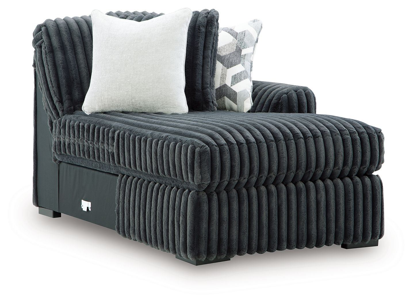 Gunmetal corner chaise with ribbed arms and white geometric throw cushions