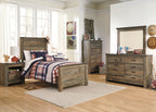 Dark brown panel bed with tall headboard, dressed in plaid bedding and pillows