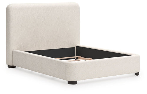 Beige upholstered bed with open storage base, padded sides, and block legs