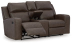 Granite gray double recliner loveseat with center console and extended footrests