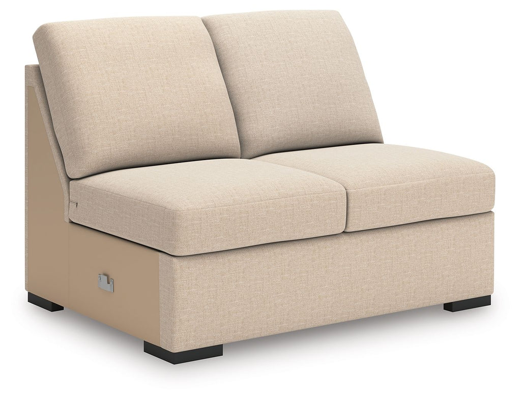 Armless loveseat in light beige twill with two back cushions and low black legs