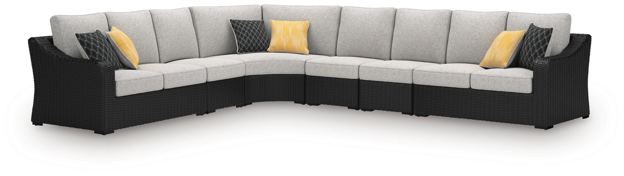 Outdoor sectional sofa with gray cushions, black frame, yellow accent pillows