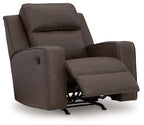 Dark gray fabric rocker recliner with extended footrest and padded armrests