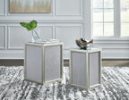 Set of 2 silver nesting end tables with textured sides and glass tops, standing together