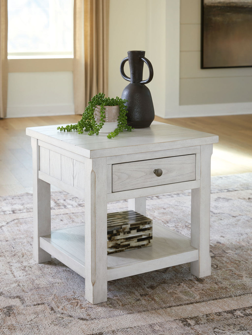 Robbinsdale white table with drawer and lower open shelf