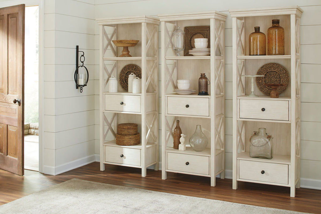 Dining table set: light wood display cabinets with open shelving and diamond-pattern doors