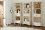 Dining table set: light wood display cabinets with open shelving and diamond-pattern doors