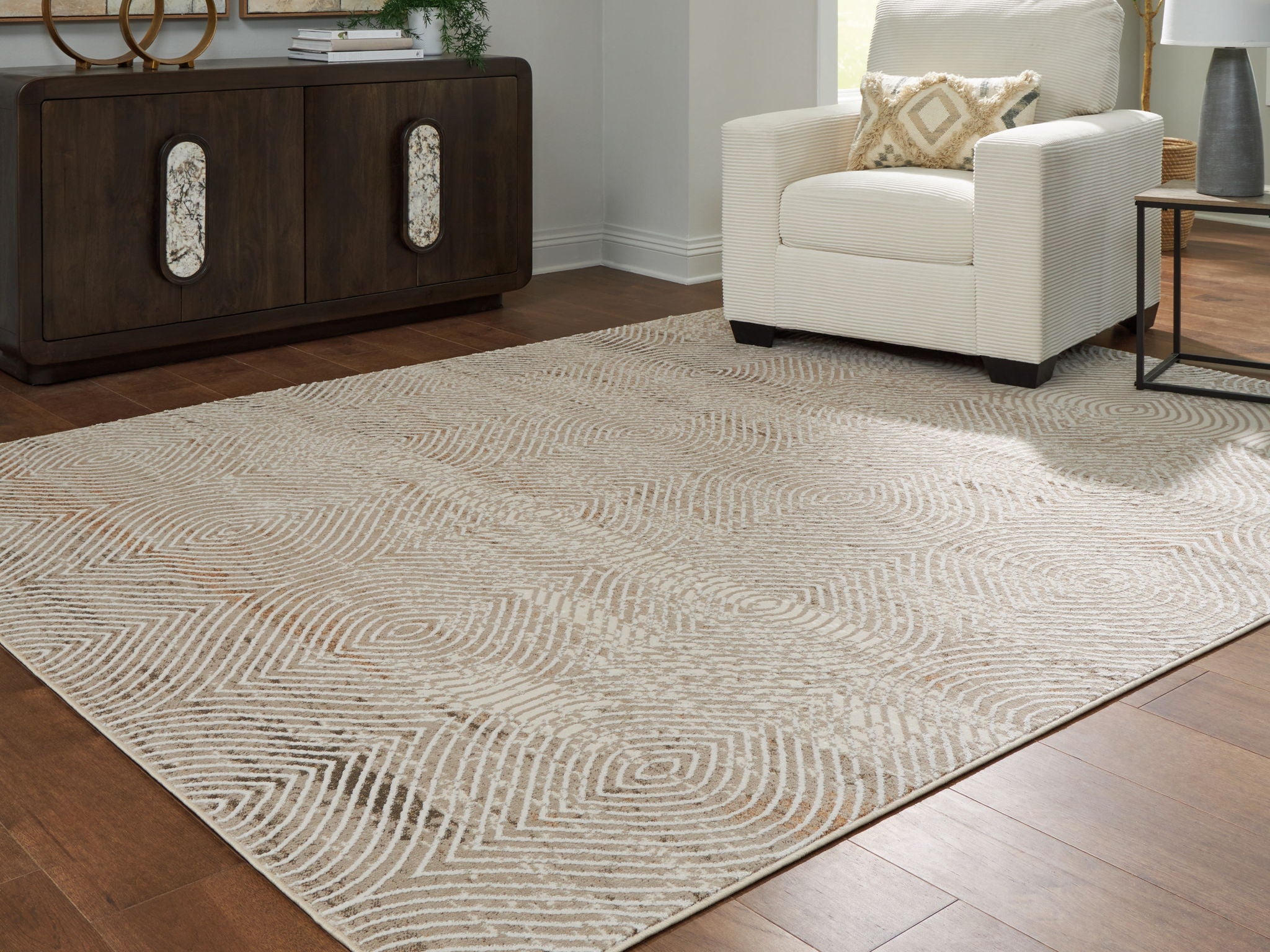 Beige geometric rug with repeating concentric diamond design, flatweave surface