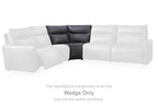 Dark gray sectional wedge component with padded backrest and armrest cushions