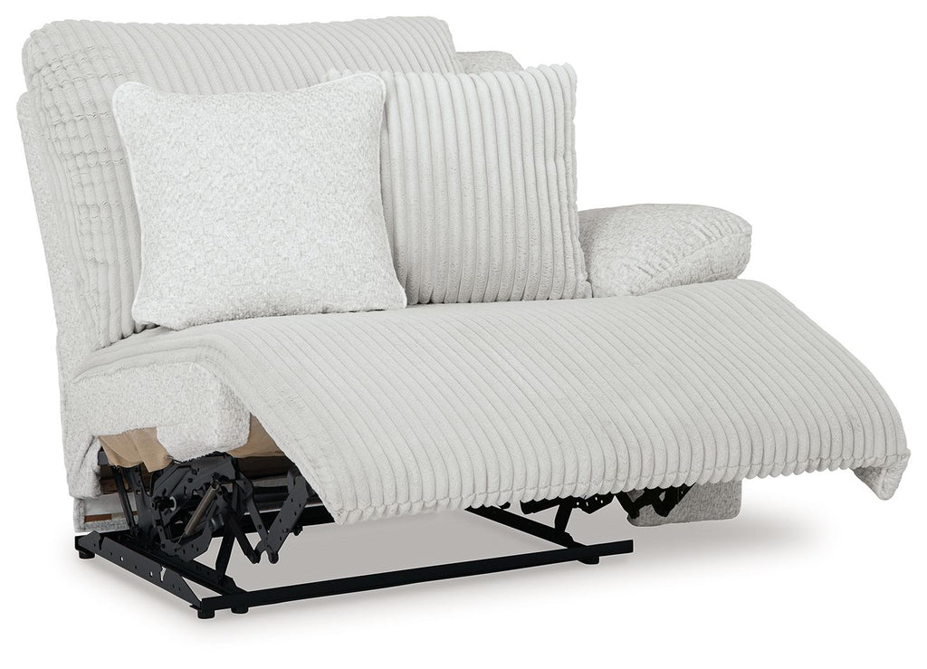 Light gray ribbed power recliner with side view and visible reclining mechanism