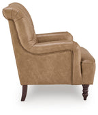 Taupe suede-look accent chair with tufted back, rounded arms, and dark wooden legs.