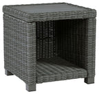 Gray wicker square end table with woven slatted top and lower shelf