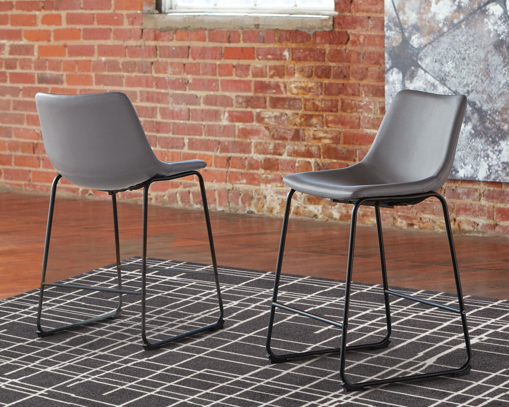 Upholstered barstool with gray seat and black metal frame, two chairs front view