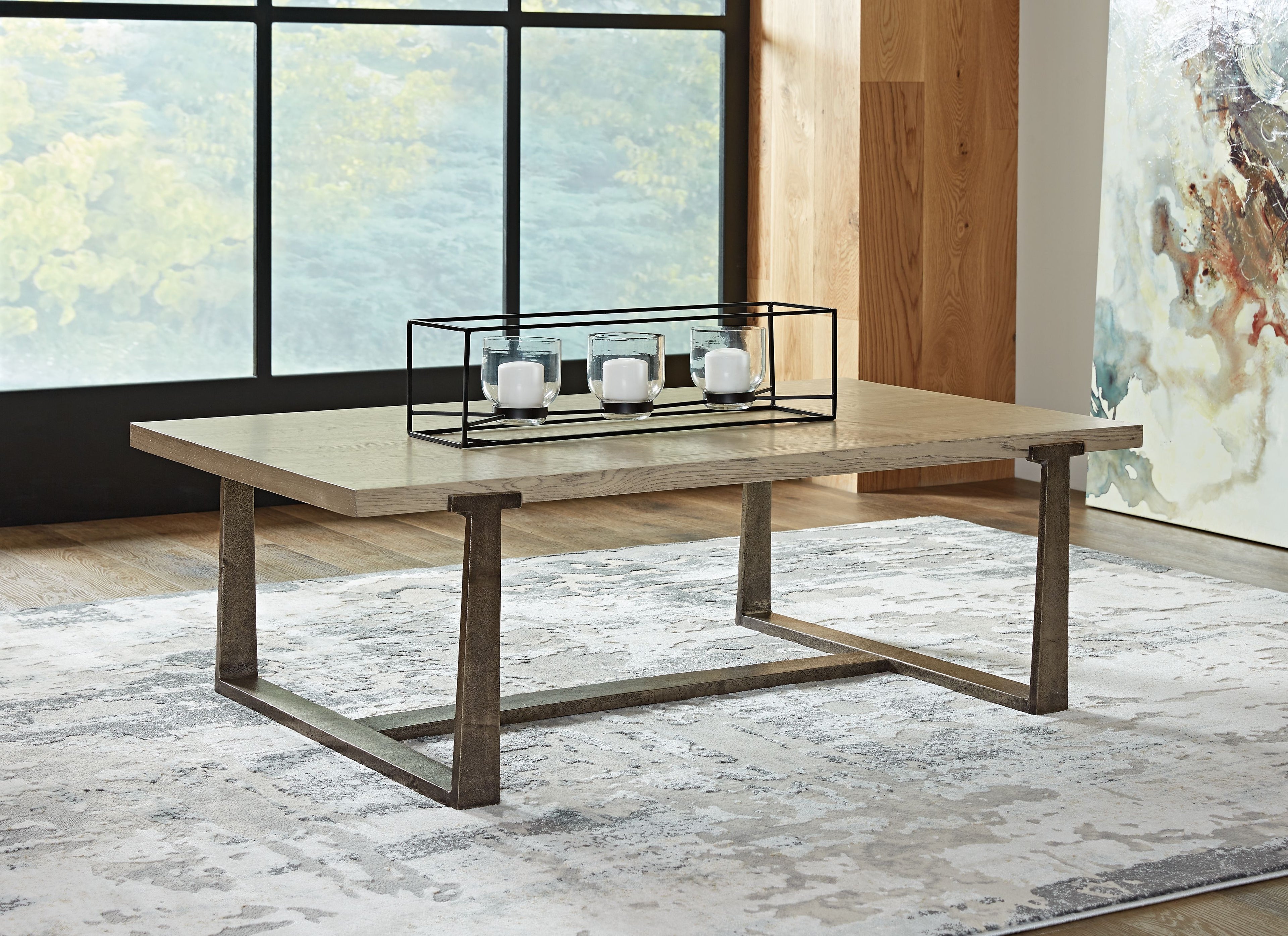 Gray rectangular cocktail table with dark metal frame and raised top for serving