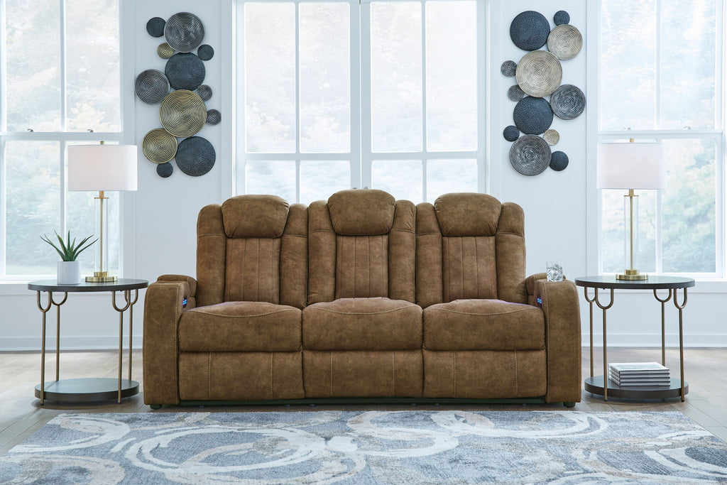 Brindle brown power reclining loveseat with padded back cushions and armrests