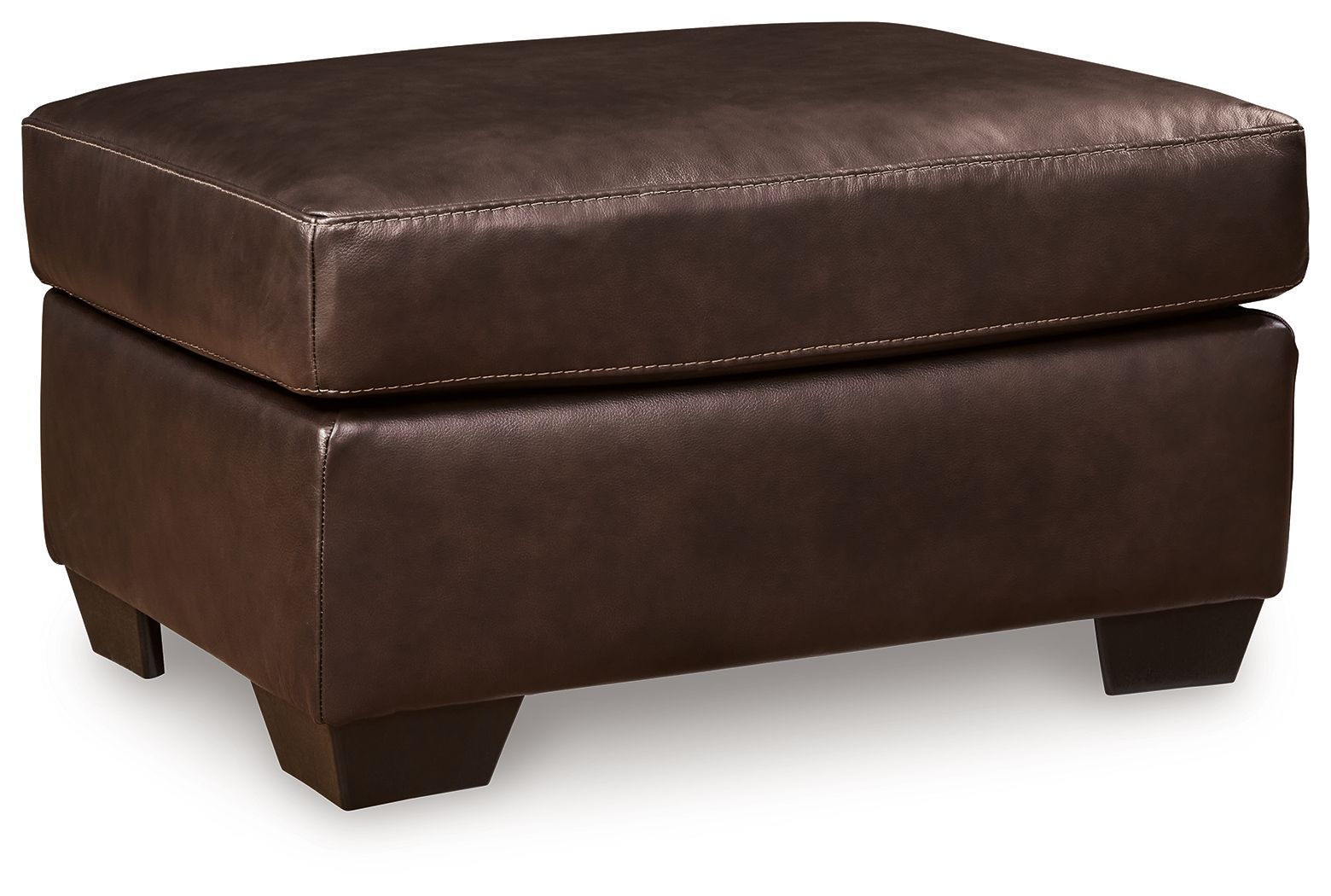 Dark brown upholstered ottoman with padded top, double-stitched trim, and block legs