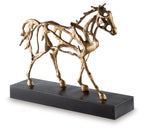 antique gold horse sculpture on dark rectangular base