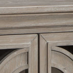Gray accent cabinet door frame close-up with carved panel detail