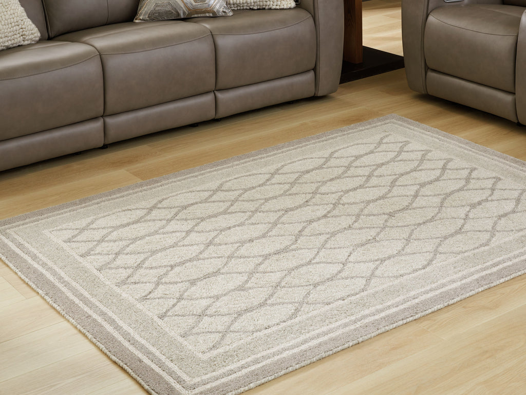 Gray area rug with trellis diamond pattern and border