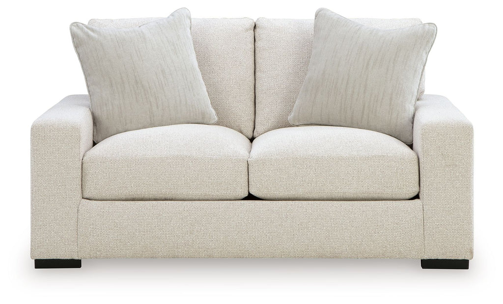 Cream linen loveseat with three back pillows and two seat cushions