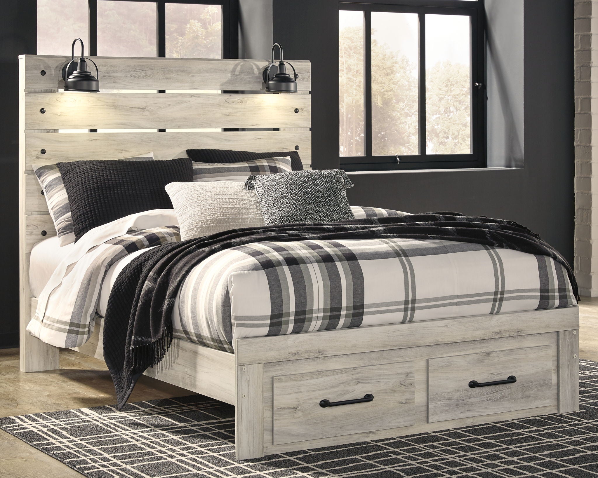 Light beige panel bed with side drawers and slatted headboard, styled with plaid bedding