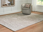 Gray area rug with linear stripe texture and short, low-profile pile