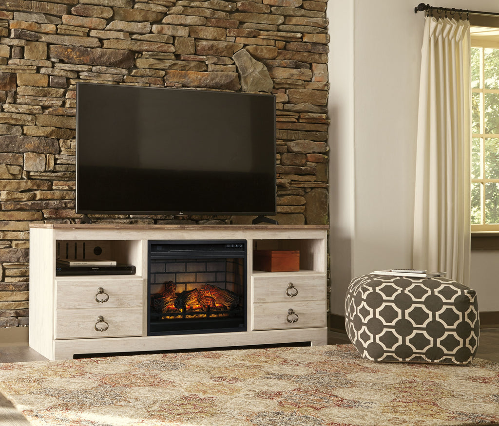 Willowton TV stand with fireplace: light wood console with lit firebox and TV above