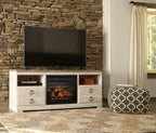 Willowton TV stand with fireplace: light wood console with lit firebox and TV above