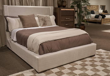 Oatmeal upholstered queen headboard and bed frame with padded posts