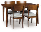 Brown dining table with four matching upholstered chairs