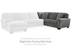 Gray and white sectional sofa with corner wedge and right-arm facing chaise