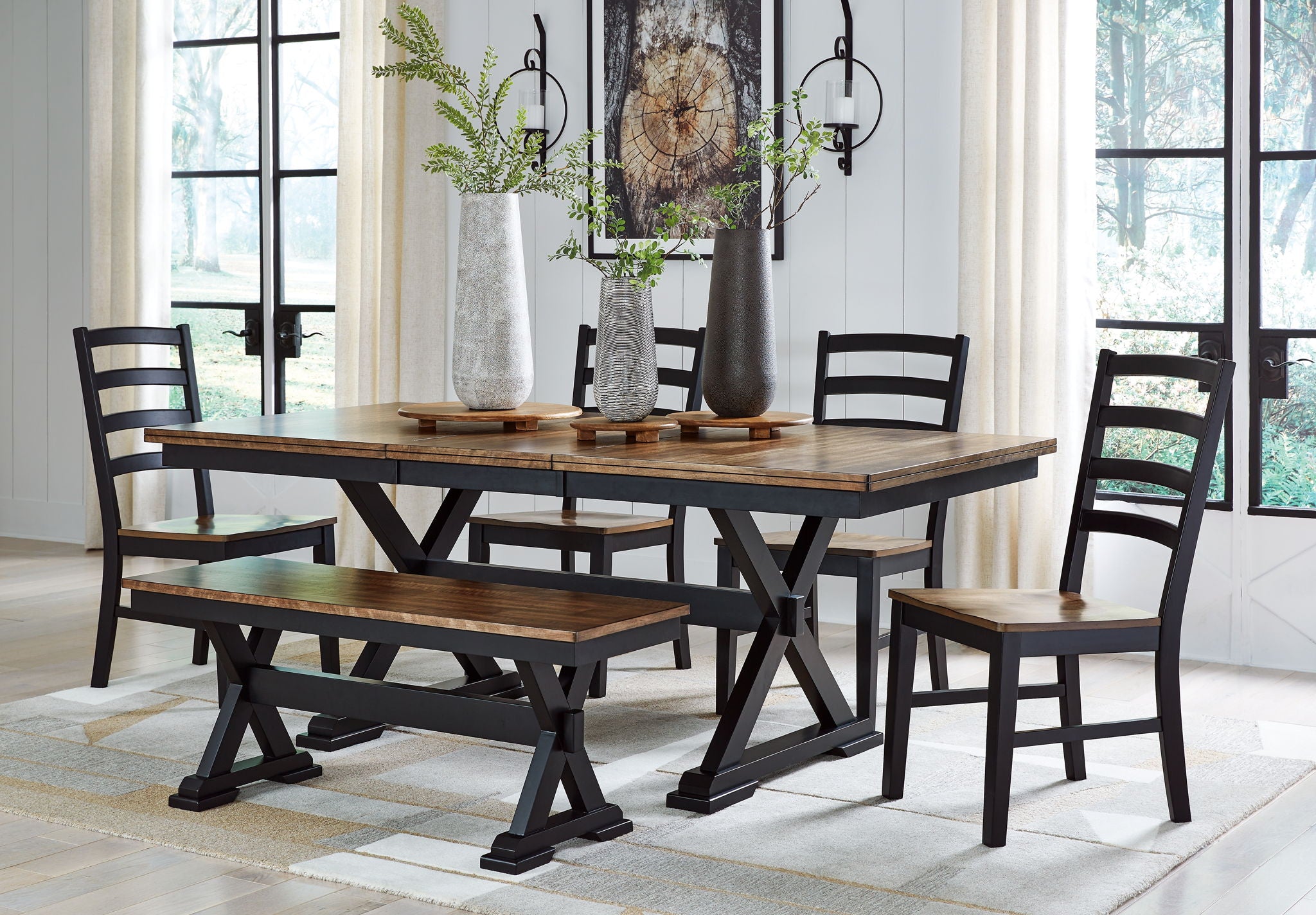 Dining table set with dark chairs and wood tabletop