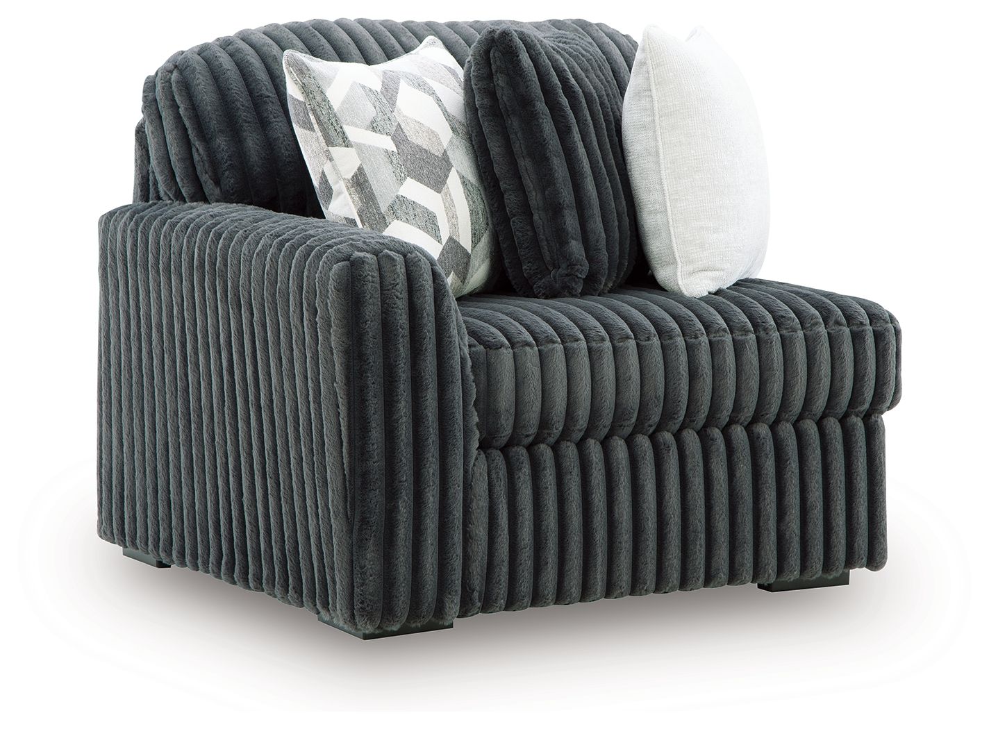 Gunmetal ribbed velvet corner chair with thick armrest and two throw pillows