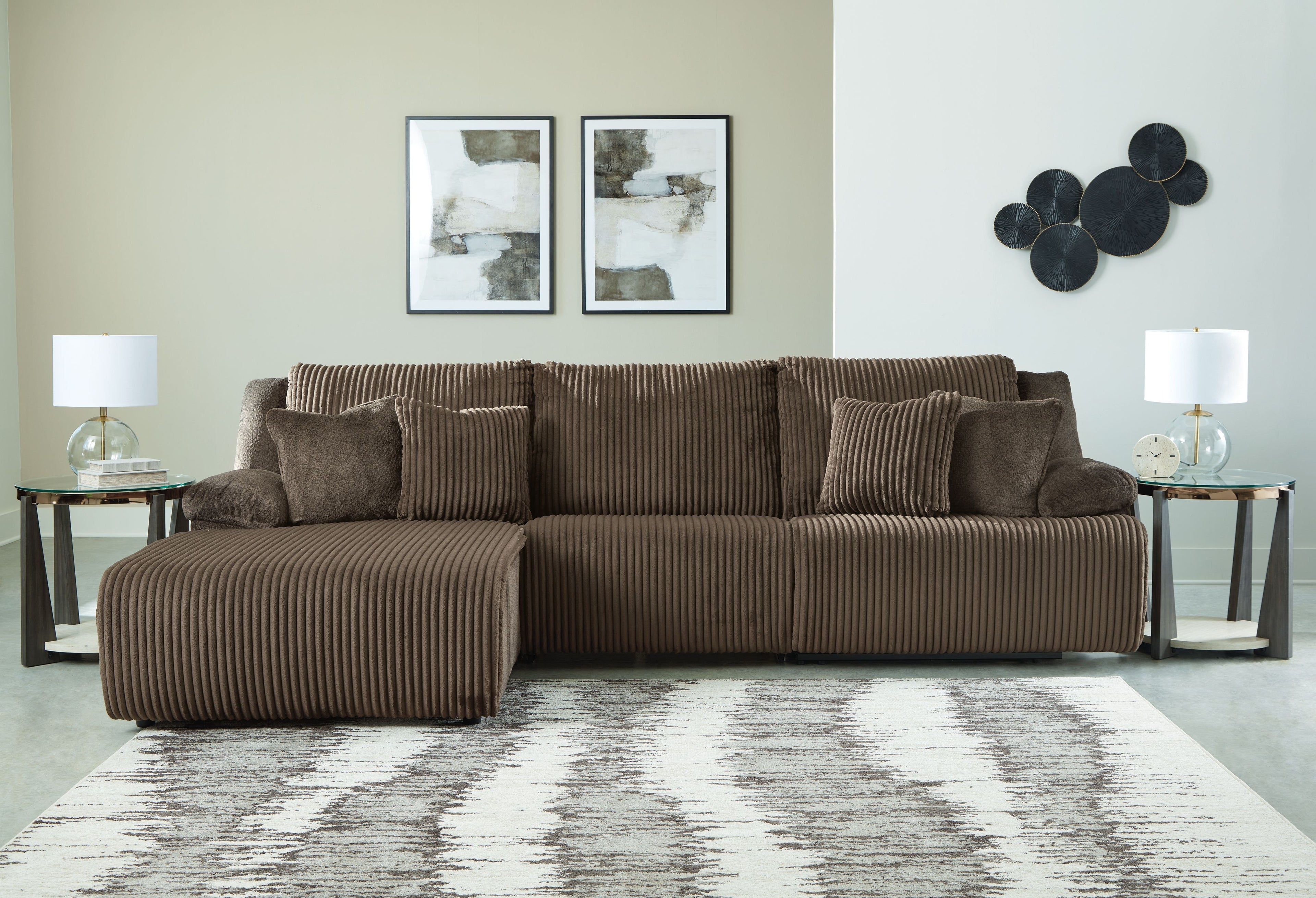 Chocolate brown reclining sectional sofa with chaise section and textured striped fabric